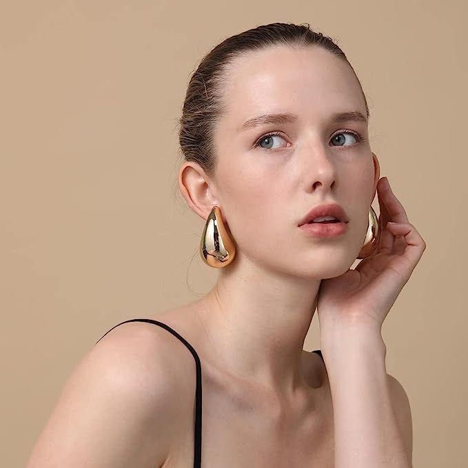 Statement earrings for women inspired by Jewellery Trends 2026